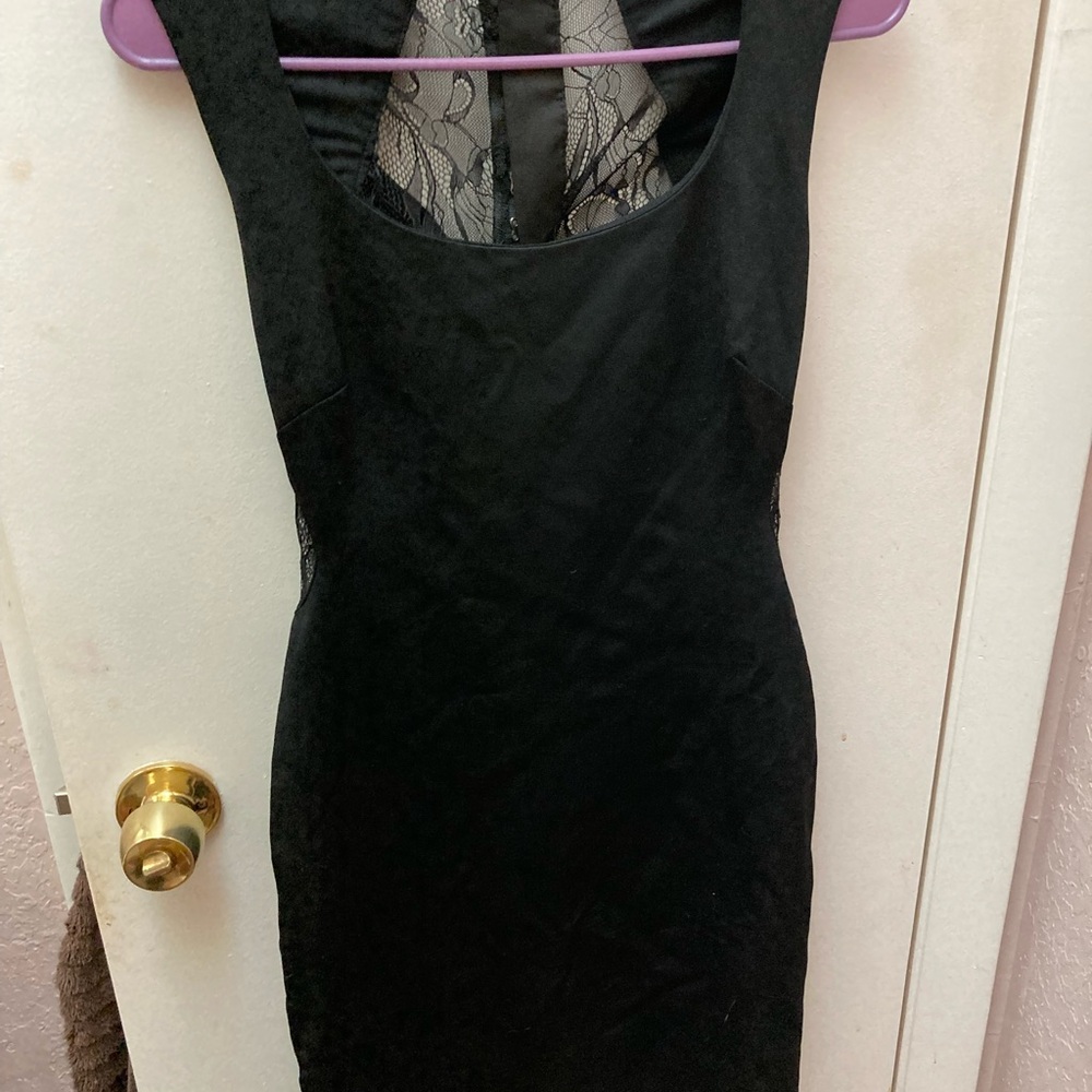 Hook and eye closures very well made BEBE dress